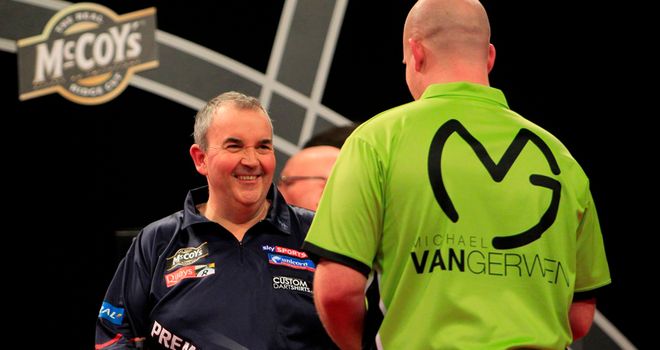 Michael van Gerwen and Phil Taylor: had to settle for a point apiece in the final match of the night