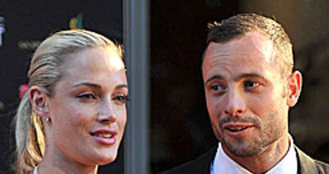 Runner Oscar Pistorius with model Reeva Steenkamp