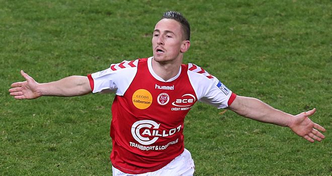 Gaetan Courtet celebrates his equaliser for Reims