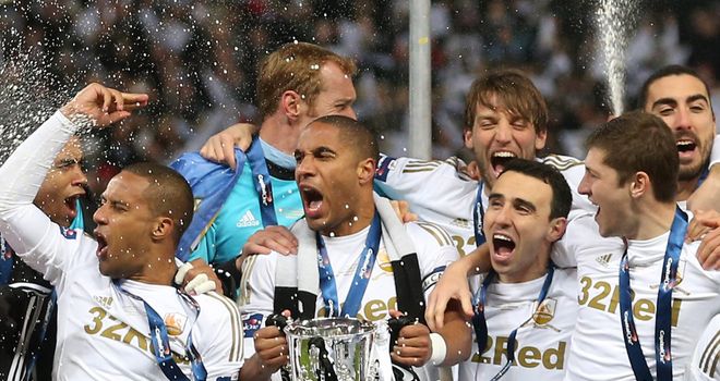 Swansea celebrate the first major silverware in the club's history