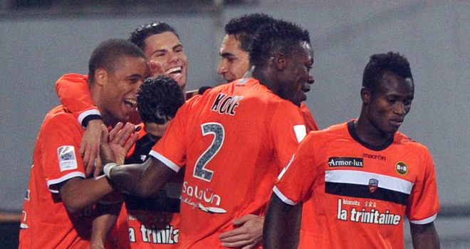 Lorient celebrate Kevin Monnet-Paquet's winning goal