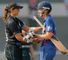 England's Charlotte Edwards is congratulated by New Zealand's Suzannah Bates