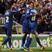 Oldham celebrate their early goal against Everton