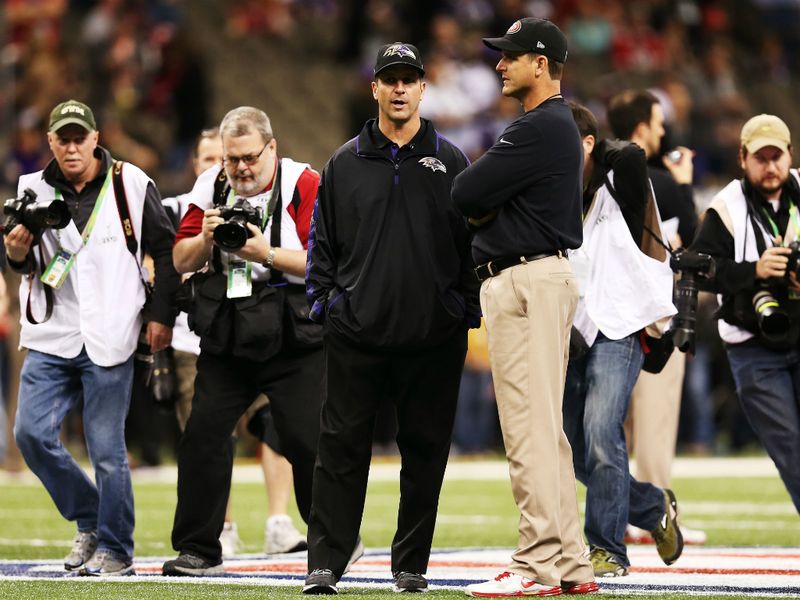 Jim also met with brother John - the Ravens head coach - on the pitch prior to kick-off