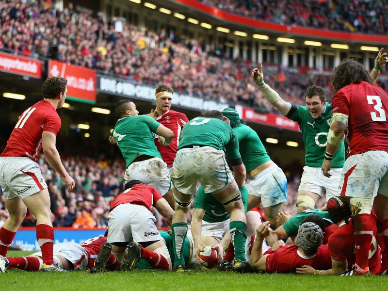 Pushing on: Brian O'Driscoll scores the third try for the visitors soon after the re-start