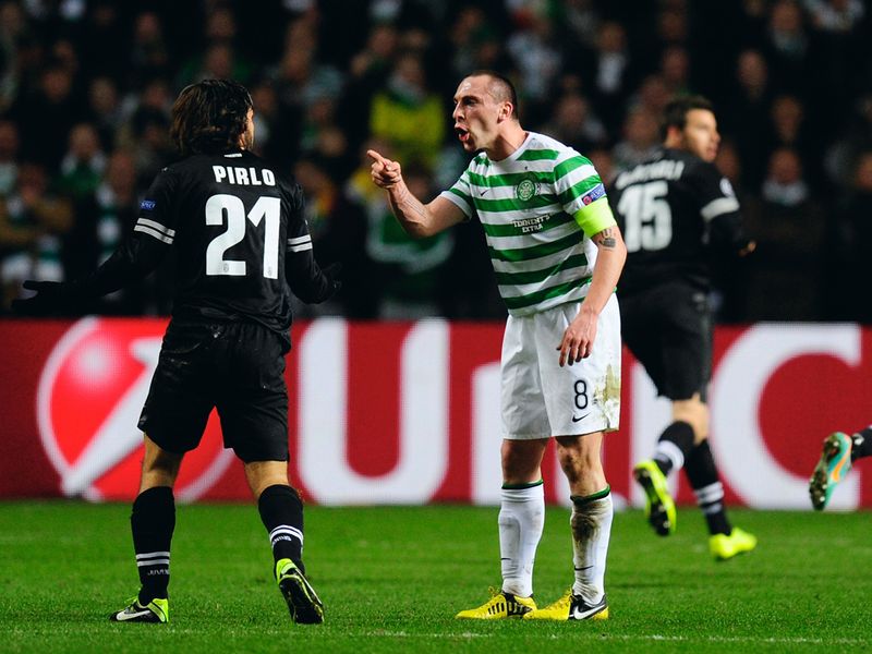 Scott Brown exchanges words with Andrea Pirlo