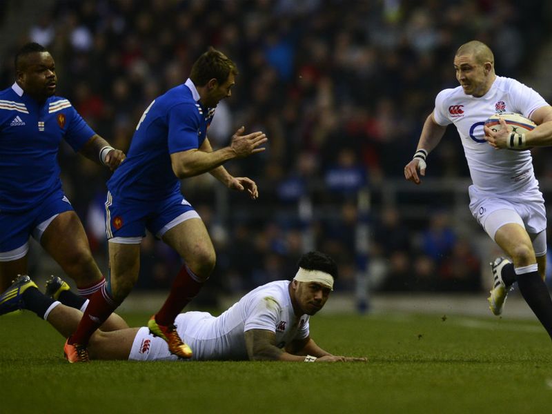 Wing Mike Brown makes a rare clean break for England