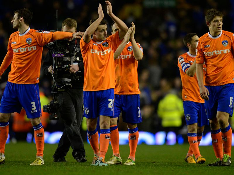 Oldham applaud their fans at the final whistle but it's Everton who advance to the quarter-finals.