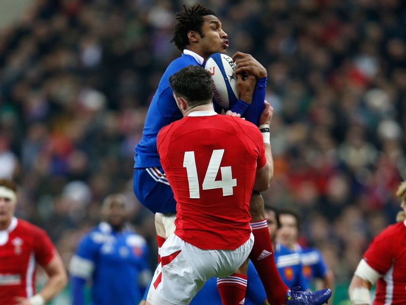 High ball: Benjamin Fall makes a catch under pressure from Alex Cuthbert