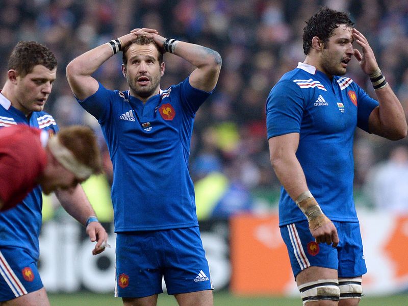 French despair: Frederic Michalak puts his hands on his head after Wales score the decisive try
