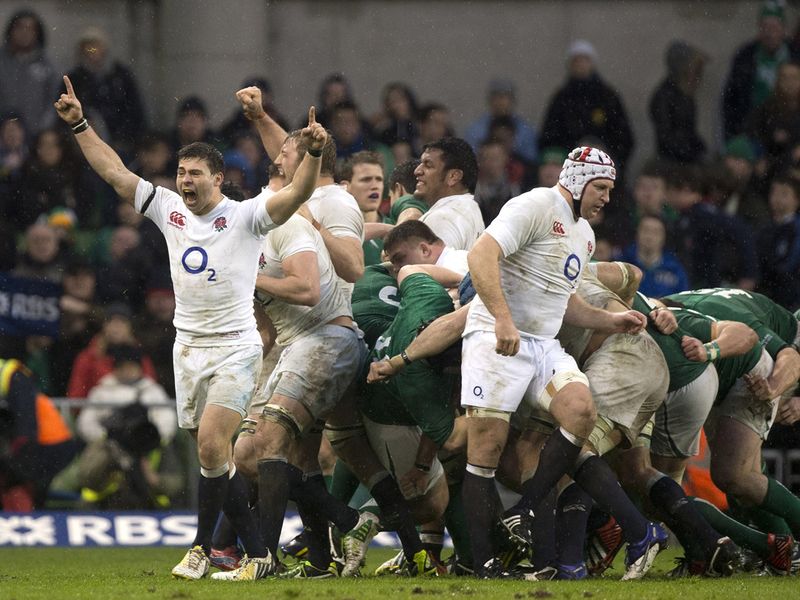 Final whistle: Ben Youngs (far left) celebrates England's battling victory