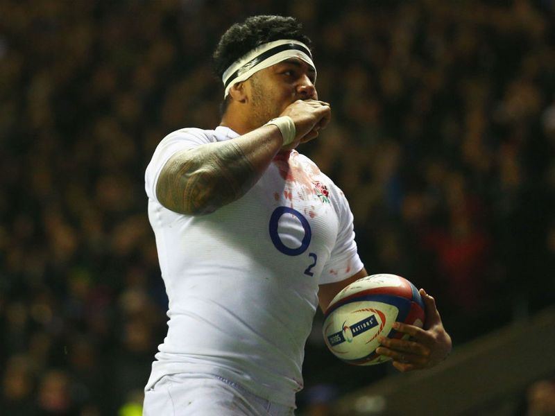 Tuilagi celebrates his try...