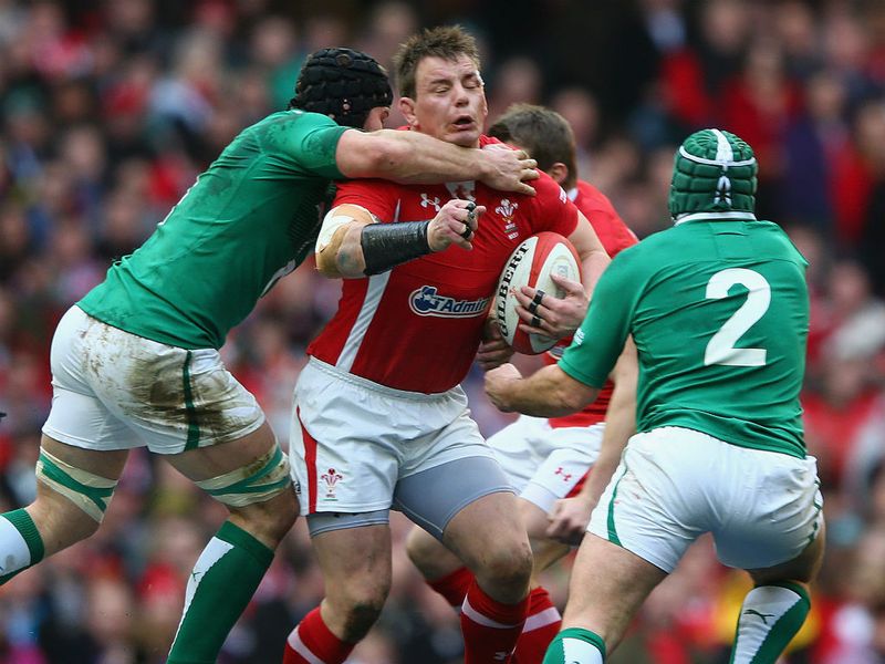 Tough tackling: Matthew Rees is tackled by Sean O'Brien