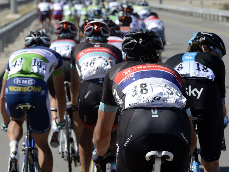 Wiggins, right, dropped back as teams prepared for the sprint