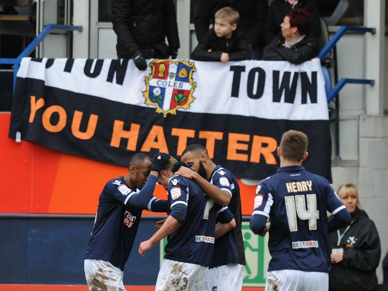 Rob Hulse is mobbed by team-mates after doubling Millwall's lead over Luton
