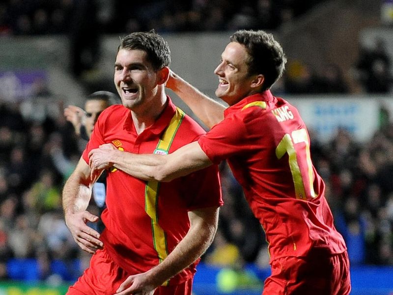 Sam Vokes doubles Wales' advantage and they hold on to win 2-1 at the Liberty Stadium