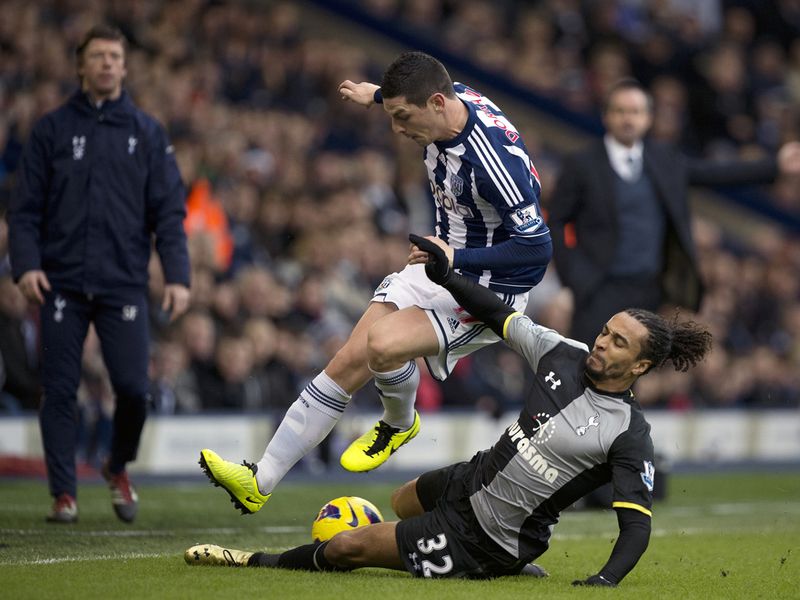 Graham Dorrans and Benoit Assou-Ekotto tangled.