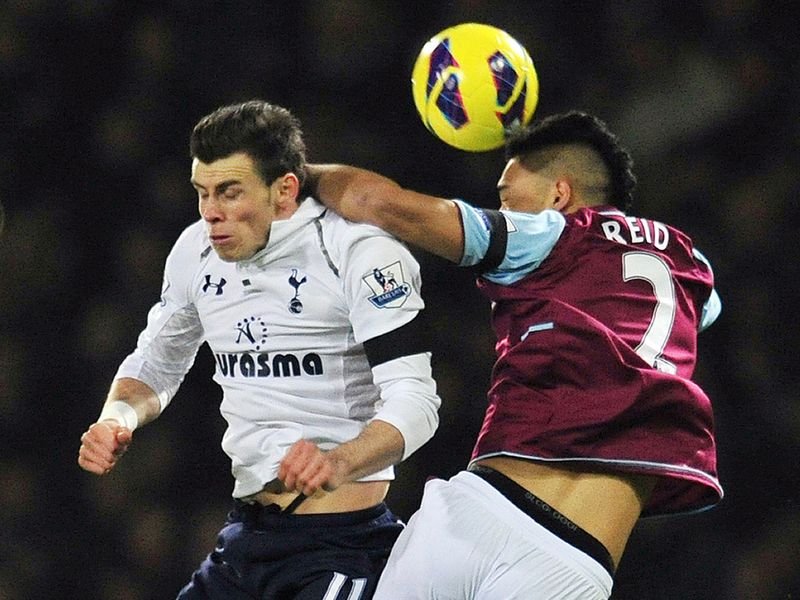 Bale jumped for the ball with Winston Reid.