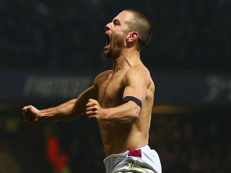 A topless Cole celebrated his first goal upon his Hammers return.