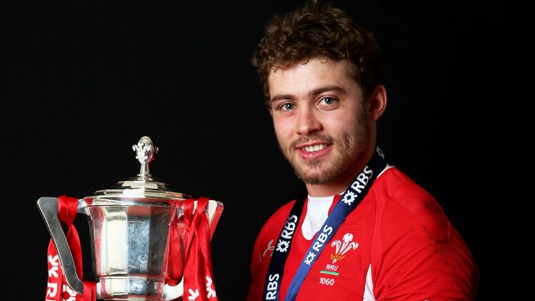 Player of the 2013 tournament Leigh Halfpenny parades the trophy