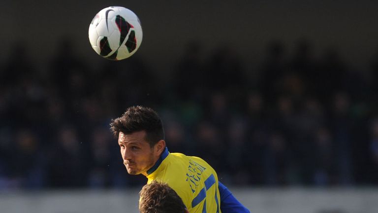 Cyril Thereau beats Hugo Campagnaro to a header.