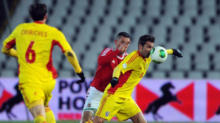 Battle: Adrian Mutu and Norbert Meszaros vie for the ball in 2-2 draw