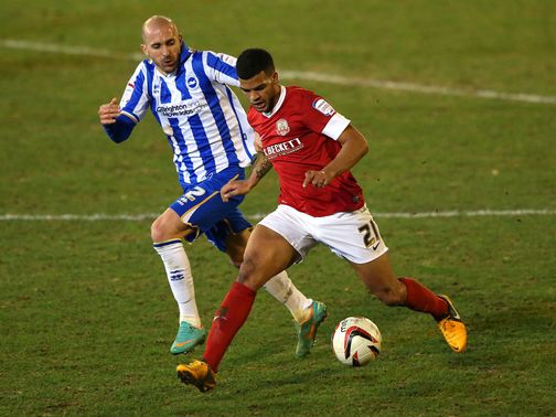 Jacob Mellis holds off Bruno Saltor