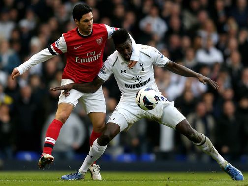 Emmanuel Abebayor tries to hold the ball up