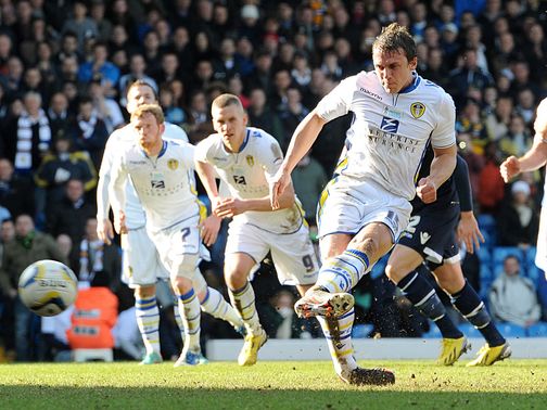 Leeds' Stephen Warnock slots home from the spot