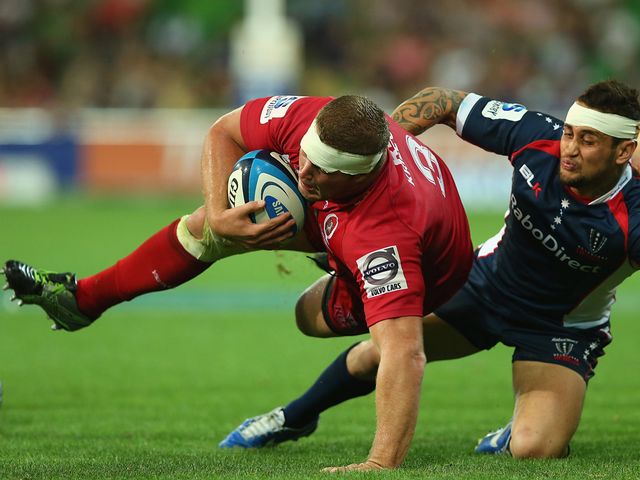 James Slipper of the Reds is tackled