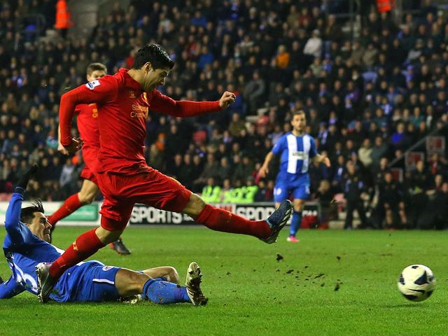 Suarez scores to complete his hat-trick