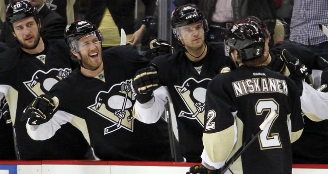 Matt Niskanen: Is congratulated after his winning strike