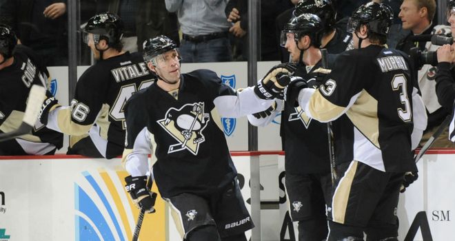 Pascal Dupuis (left) is congratulated after scoring