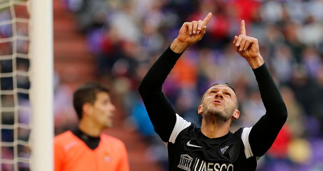Martin Demichelis celebrates his goal for Malaga
