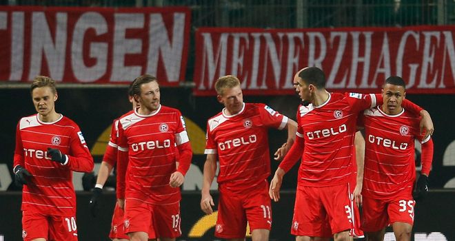 Fortuna Dusseldorf celebrate Mathis Bolly's goal