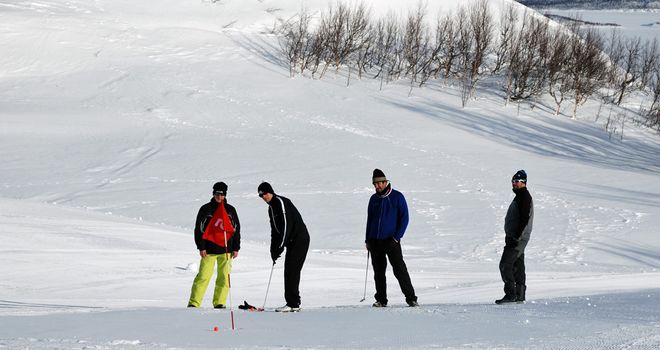 Snow golf in Swedish Lapland
