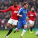Juan Mata holds off Patrice Evra as Chelsea look for an opening