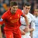 Steven Gerrard battles with Gareth Bale for the ball