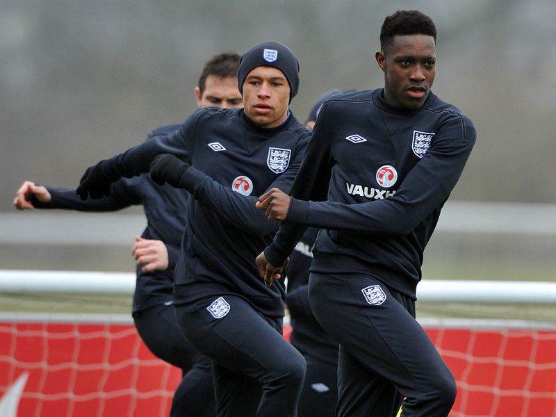 Young guns Danny Welbeck and Alex Oxlade-Chamberlain warm up.