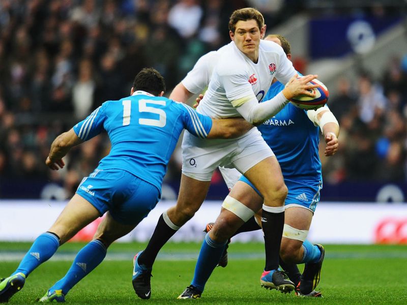 Tough challenge: Andrea Masi of Italy tackles England's Alex Goode