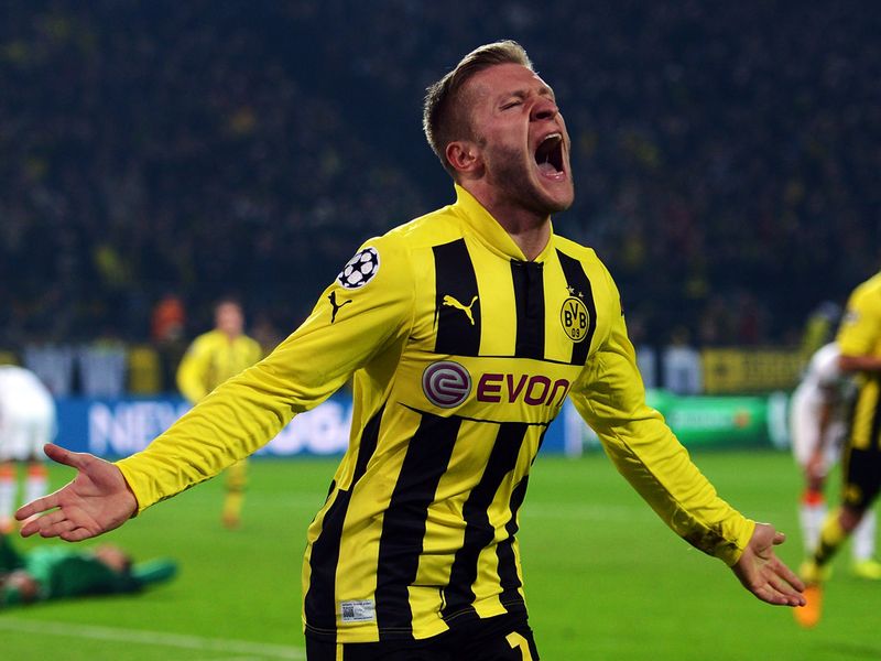 Jakub Blaszczykowski runs away in celebration having made it 3-0 to Borussia Dortmund against Shakhtar.