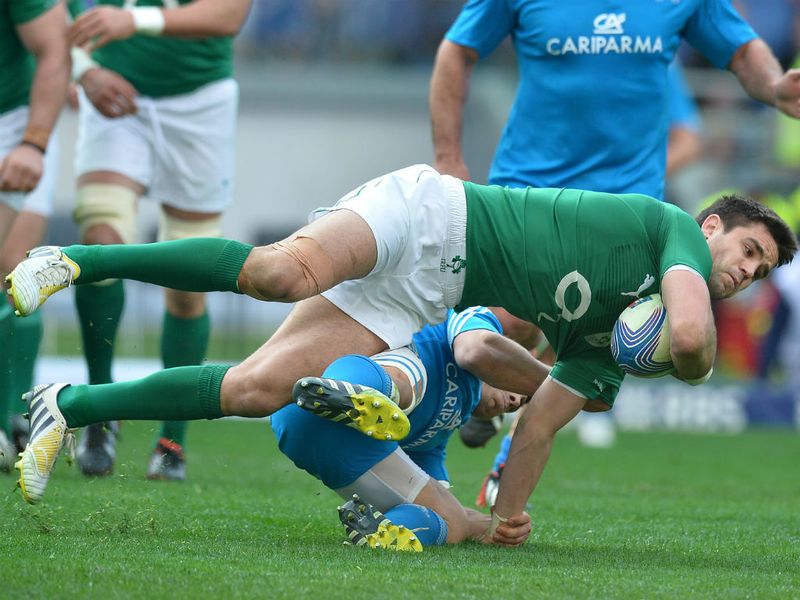 Flying challenge: Conor Murray is tackled by Edoardo Gori