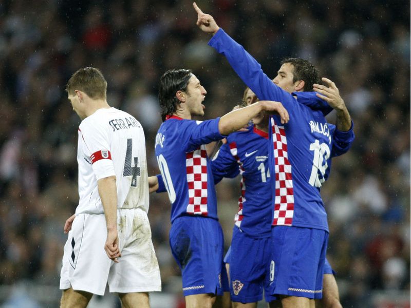 He is absent through injury as England lose 3-2 to Croatia at
Wembley and fail to qualify for Euro 2008