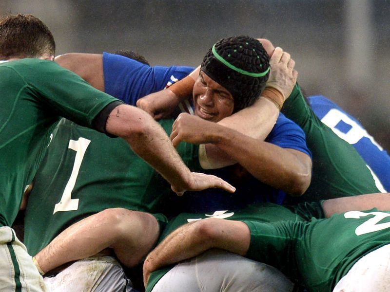 Tough battle: France's captain Thierry Dusautoir grimaces