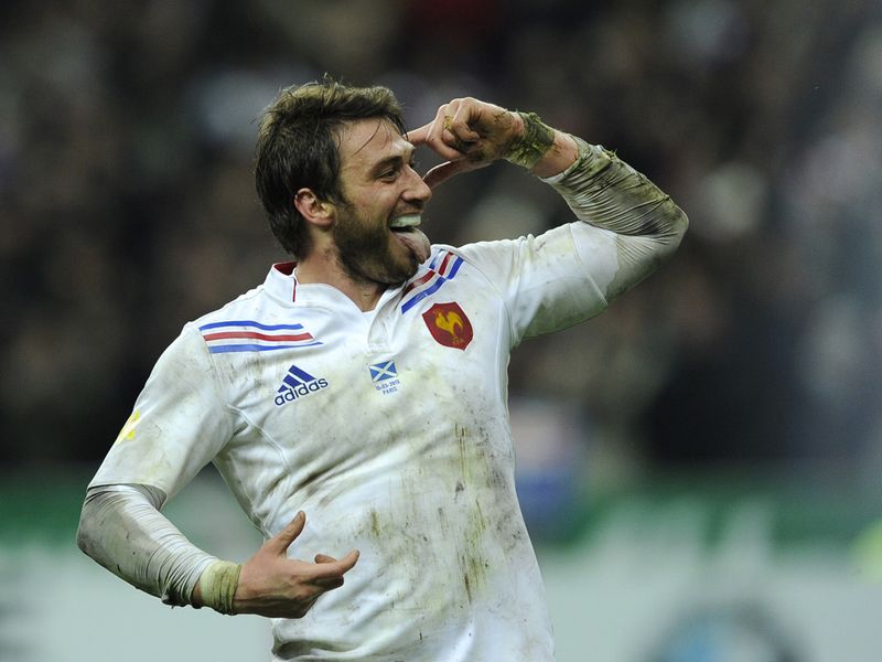 Mad for it: Maxime Medard celebrates his try as France surge clear