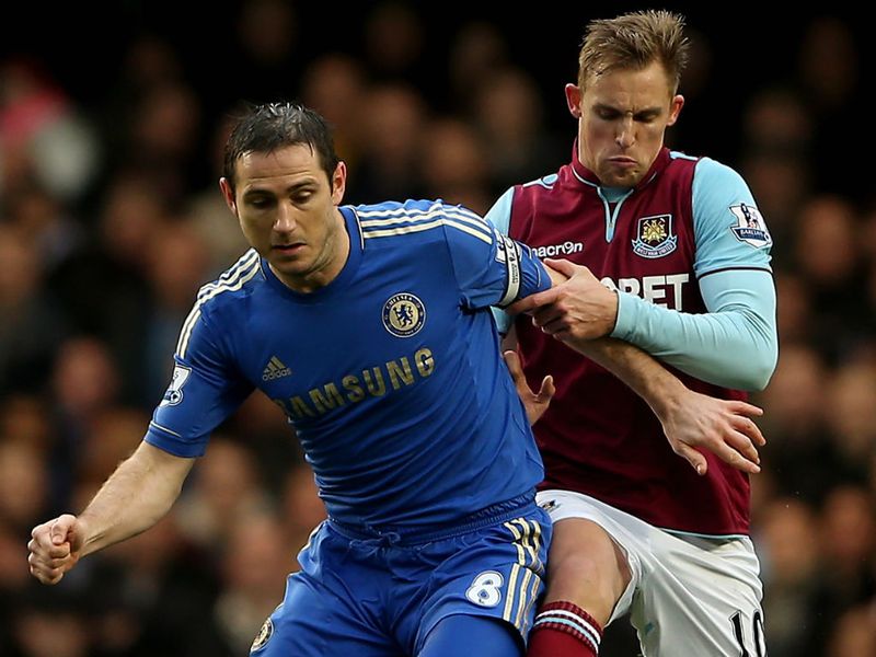 Jack Collison challenges Frank Lampard in the London derby