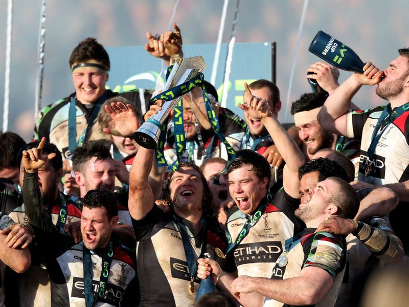 Well done: Harlequins celebrate their success