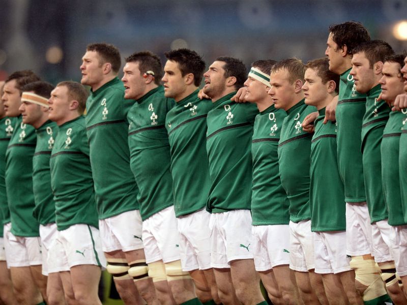 In good voice: Ireland's rugby players sing their national anthem...