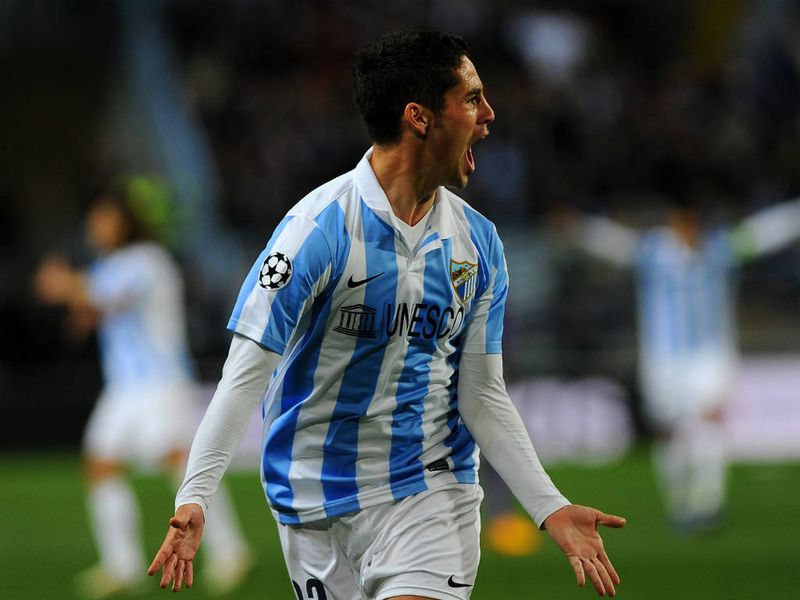Isco celebrates after scoring a stunning goal to give Malaga the lead against Porto on the night