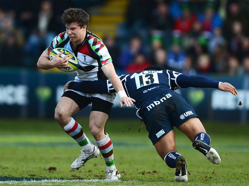 Stopped in his tracks: Sam Smith is tackled by Johnny Leota